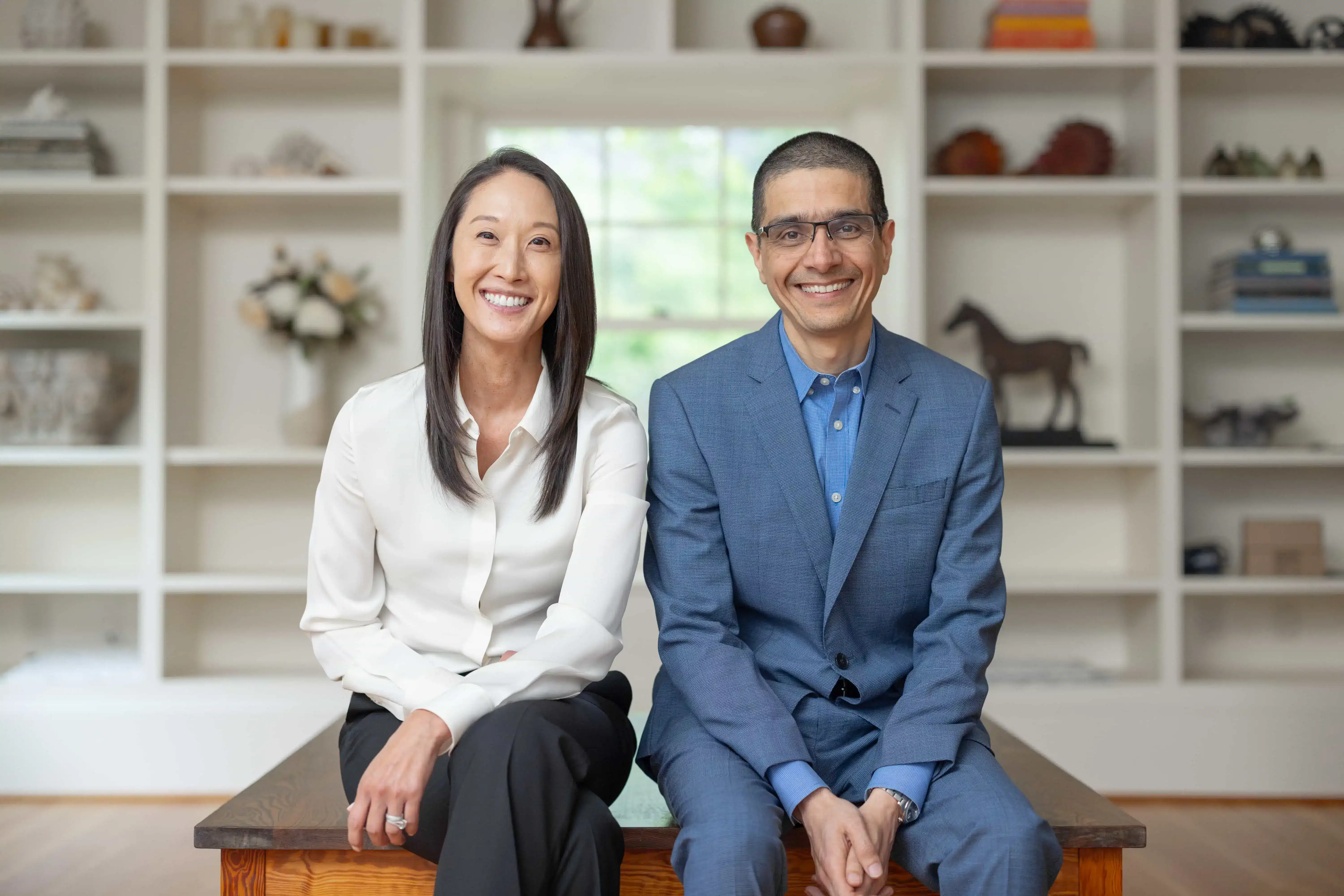 Board-certified cardiologists Dr. Christina Kang and Dr. Vikas Sharotri providing expert virtual cardiology consultation at CardioVerseMD